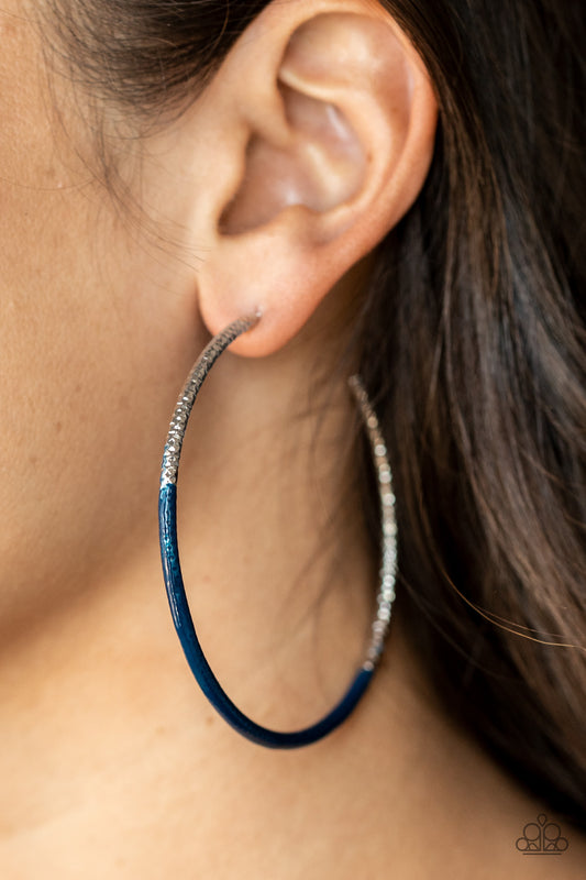 DIP, DIP, Hooray! Blue Hoop Earring - Paparazzi Accessories  Featuring faceted diamond cut texture, a shimmery silver hoop is dipped in Rhodonite paint for a colorful flair. Earring attaches to a standard post fitting. Hoop measures approximately 2 3/4" in diameter.  Sold as one pair of hoop earrings.  P5HO-BLXX-034XX
