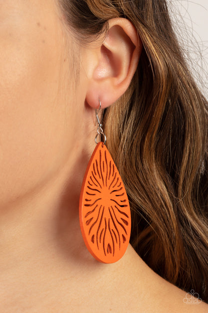 Sunny Incantations Orange Wooden Earring - Paparazzi Accessories  A whimsical sunburst pattern is cutout from an orange wooden teardrop, creating a simply seasonal frame. Earring attaches to a standard fishhook fitting.  Sold as one pair of earrings.