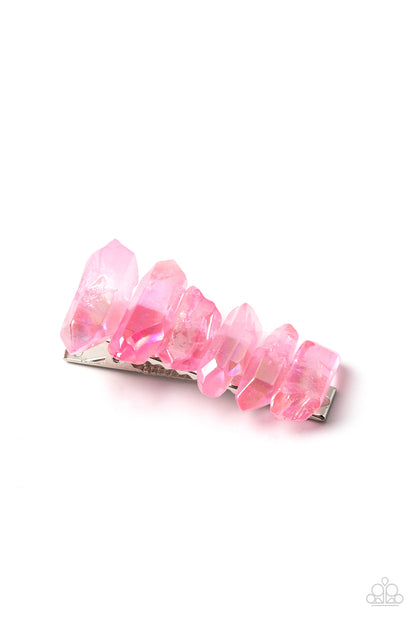 Crystal Caves Pink Hair Clip - Paparazzi Accessories  Raw cut iridescent rose quart crystals stack across the front of a rectangular silver frame, creating an ethereally earthy centerpiece. Features a standard hair clip on the back.  Sold as one individual hair clip.