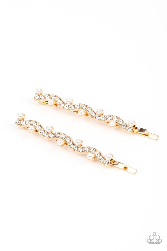 Ballroom Banquet Gold Hair Clip - Paparazzi Accessories  A wavy row of glittery white rhinestones is flanked between dainty white pearls along the front of a gold bobby pin for a refined fashion.  Sold as one pair of decorative bobby pins.