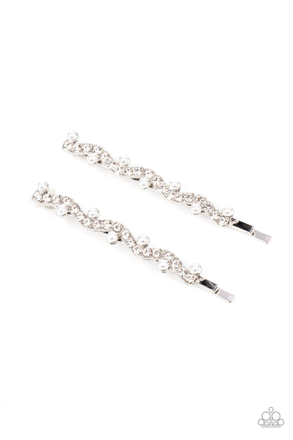 Ballroom Banquet White Hair Clip - Paparazzi Accessories  A wavy row of glittery white rhinestones is flanked between dainty white pearls along the front of a silver bobby pin for a refined fashion.  Sold as one pair of decorative bobby pins.