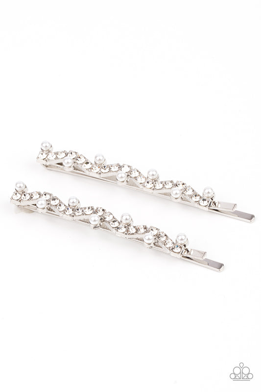 Ballroom Banquet White Hair Clip - Paparazzi Accessories  A wavy row of glittery white rhinestones is flanked between dainty white pearls along the front of a silver bobby pin for a refined fashion.  Sold as one pair of decorative bobby pins.