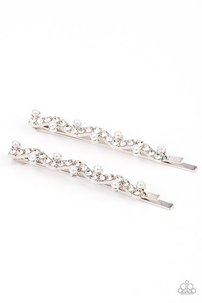Ballroom Banquet White Hair Clip - Paparazzi Accessories  A wavy row of glittery white rhinestones is flanked between dainty white pearls along the front of a silver bobby pin for a refined fashion.  Sold as one pair of decorative bobby pins.