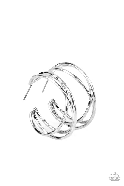 City Contour Silver Hoop Earring - Paparazzi Accessories  Glistening silver bars delicately overlap into a 3-dimensional frame, creating a dramatic hoop. Earring attaches to a standard post fitting. Hoop measures approximately 1" in diameter.  Sold as one pair of hoop earrings.
