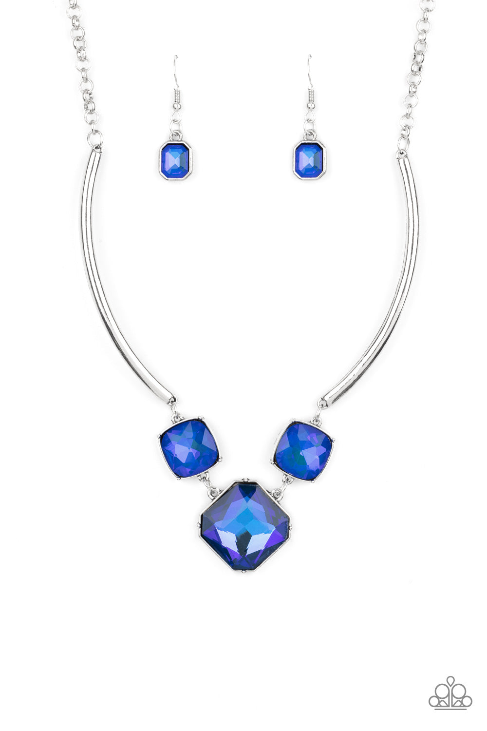 Divine IRIDESCENCE Blue Necklace - Paparazzi Accessories  Featuring a subtle UV shimmer, an oversized collection of radiant cut blue gems delicately link at the bottom of two curved silver rods. Attached to shiny silver chains, the glamorously glitzy display sparkles below the collar for a jaw-dropping finish. Features an adjustable clasp closure.  All Paparazzi Accessories are lead free and nickel free!  Sold as one individual necklace. Includes one pair of matching earrings.
