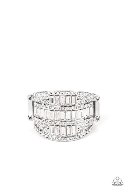 Red Carpet Redux White Ring - Paparazzi Accessories  The front of a silver oval frame is encrusted in stacked rows of emerald and round cut white rhinestones, coalescing into a blinding centerpiece atop the finger. Features a stretchy band for a flexible fit.  Sold as one individual ring.