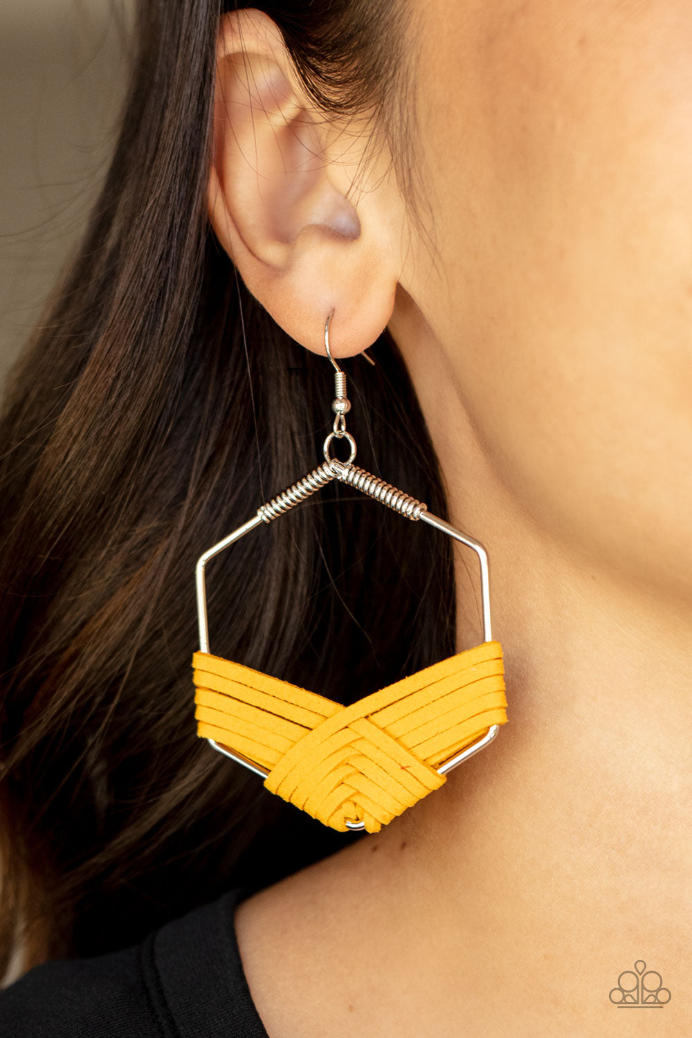 Suede Solstice Yellow Earring - Paparazzi Accessories  Strands of yellow suede decoratively weaves around the bottom of a hexagonal silver frame, creating a colorfully rustic centerpiece. Earring attaches to a standard fishhook fitting.  Sold as one pair of earrings.