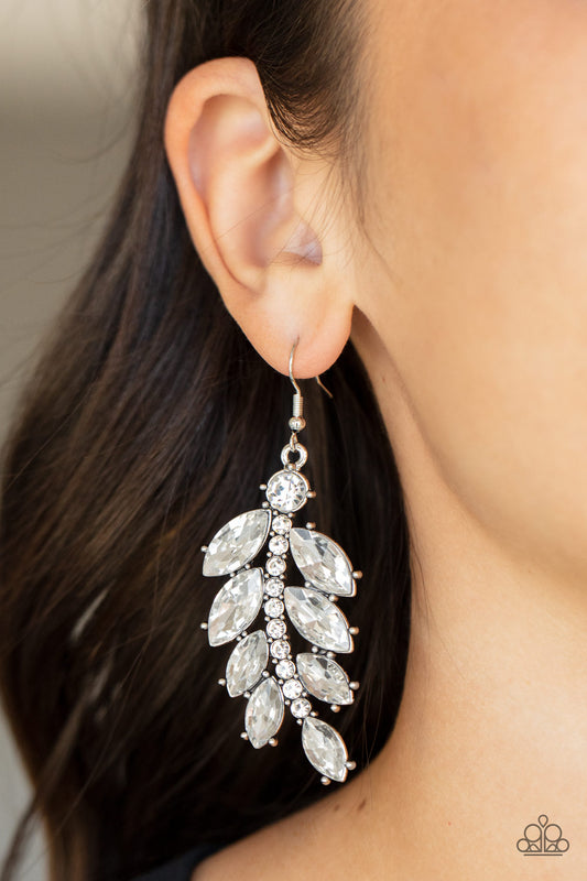 Ice Garden Gala White Earring - Paparazzi Accessories  Oversized marquise cut white rhinestones fan out from a curved silver bar encrusted in glassy white rhinestones, resulting into a glamorously leafy statement piece. Earring attaches to a standard fishhook fitting.  Sold as one pair of earrings.