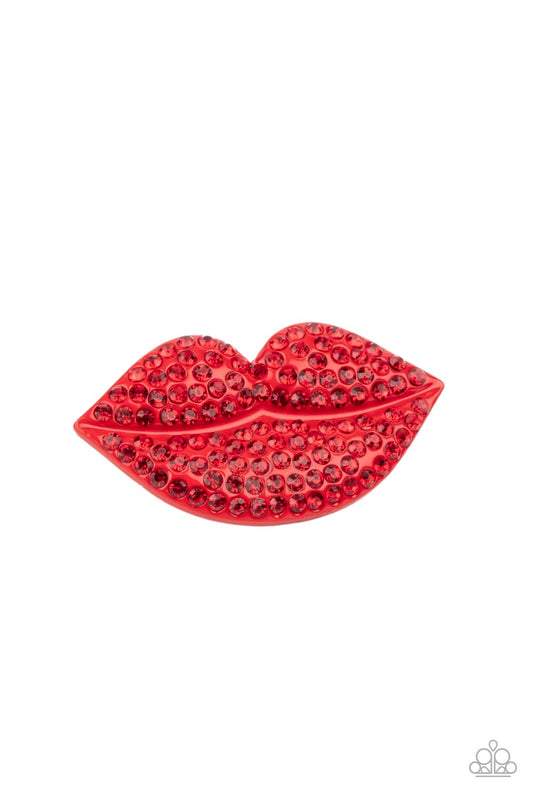 HAIR Kiss Red Hair Clip - Paparazzi Accessories  Dotted with fiery red rhinestones, a glittery red pair of lips adorns the front of a classic silver frame for a glamorous finish. Features a standard hair clip on the back.  Sold as one individual hair clip.