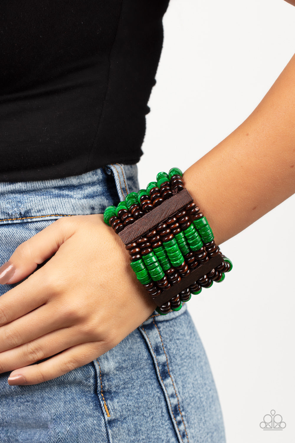 Vacay Vogue - Green Item #P9SE-GRXX-155XX Held together by rectangular wooden frames, rows of brown wooden and distressed Leprechaun discs are threaded along stretchy bands around the wrist for a seasonal pop of color around the wrist.  Sold as one individual bracelet.