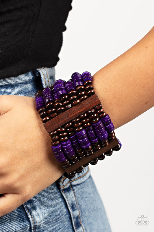 Vacay Vogue Purple Wooden Bracelet - Paparazzi Accessories Item #P9SE-PRXX-163XX Held together by rectangular wooden frames, rows of brown wooden and distressed purple discs are threaded along stretchy bands around the wrist for a seasonal pop of color around the wrist.  Sold as one individual bracelet.