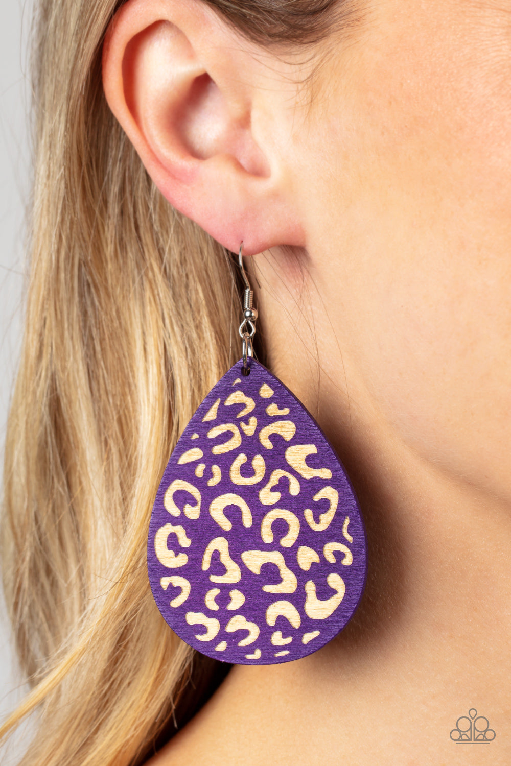 Suburban Jungle Purple Wooden Earring - Paparazzi Accessories  A purple wooden teardrop frame is etched in a cheetah-like pattern, creating a wildly fabulous fashion. Earring attaches to a standard fishhook fitting.  Sold as one pair of earrings.
