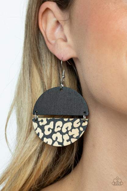 Jungle Catwalk Black Wooden Earring - Paparazzi Accessories  A plain black half moon wooden frame links with a matching wooden frame that has been etched in a cheetah-like pattern, creating a wild lure. Earring attaches to a standard fishhook fitting.  Sold as one pair of earrings.  P5SE-BKXX-260XX
