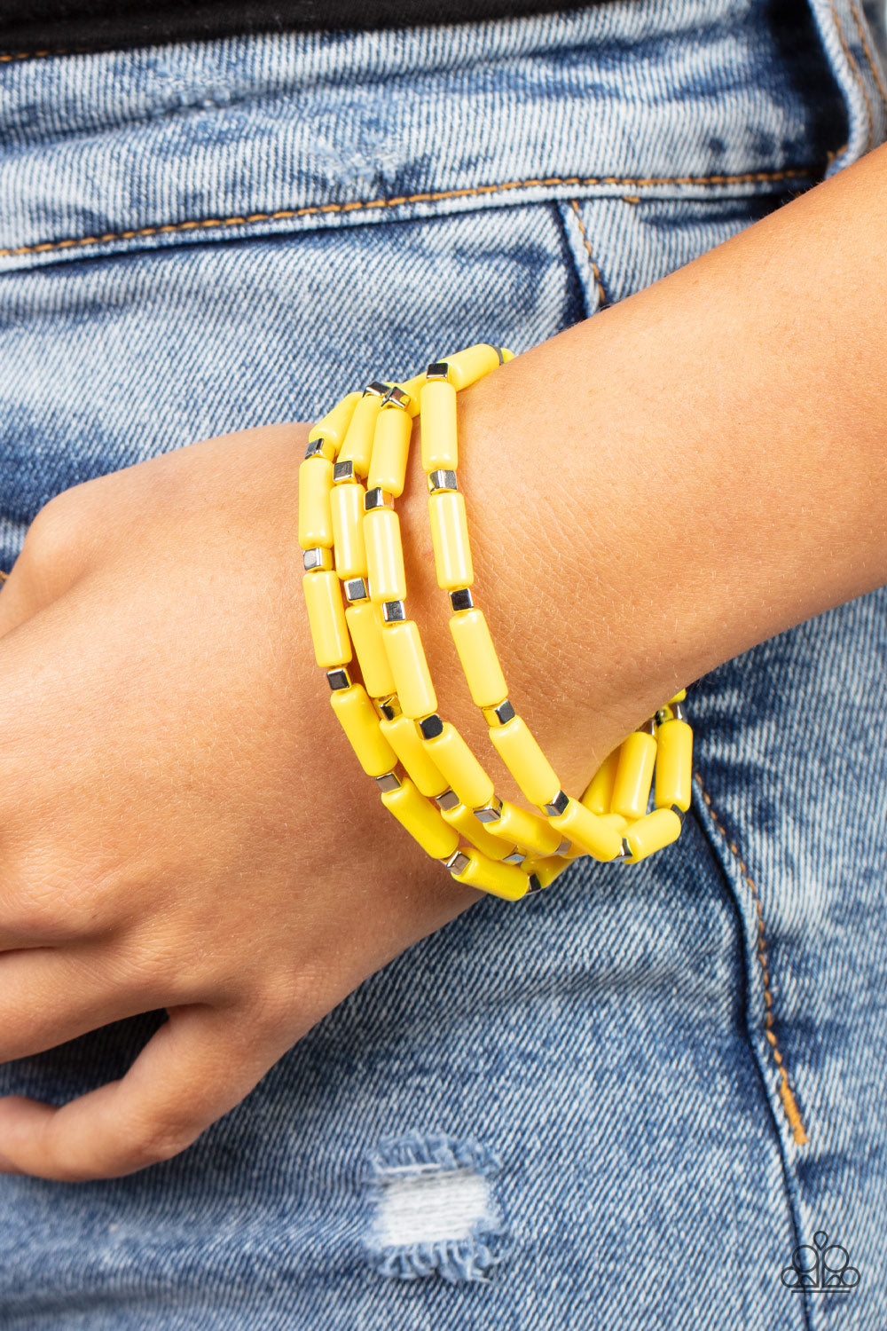 Radiantly Retro Yellow Bracelet - Paparazzi Accessories  A playful collection of dainty silver cube beads and cylindrical Illuminating beads are threaded along stretchy bands, creating colorful layers around the wrist.  All Paparazzi Accessories are lead free and nickel free!  Sold as one set of four bracelets.