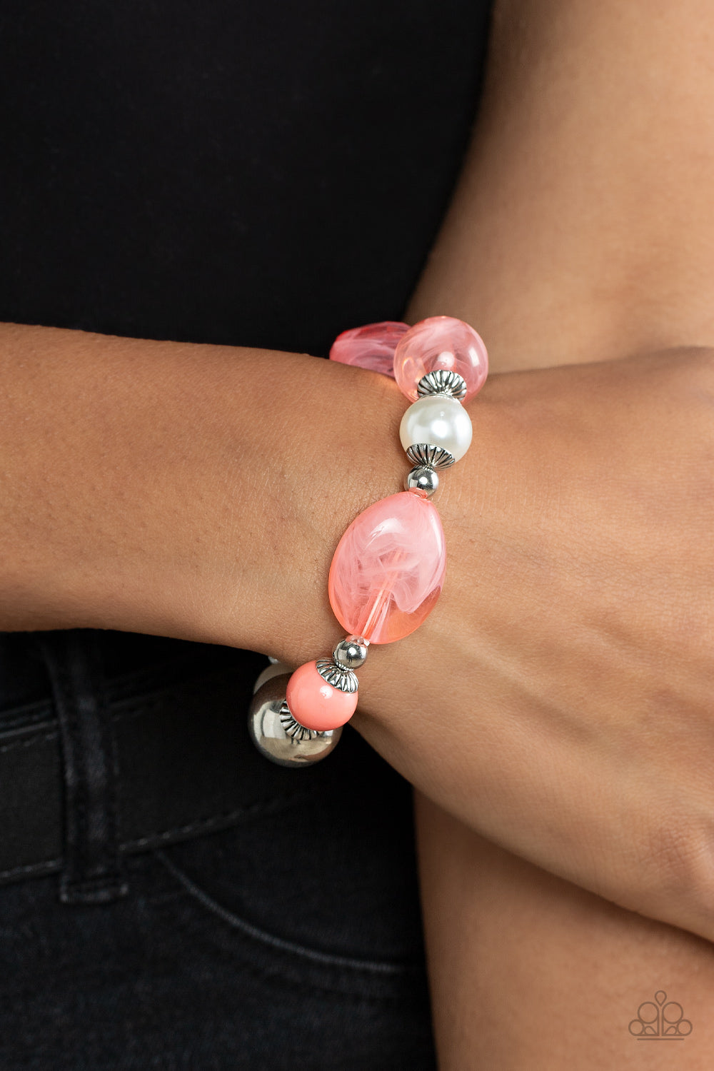 Resort Ritz Orange Bracelet - Paparazzi Accessories  A lavish assortment of white pearls, silver accents, and glassy and acrylic coral beads are threaded along a stretchy band around the wrist for a refreshing pop of color.  Sold as one individual bracelet.