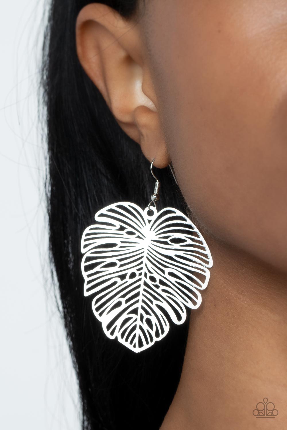 Palm Palmistry Silver Earring - Paparazzi Accessories  A stenciled silver palm-like leaf delicately swings from the ear, creating a refined seasonal display. Earring attaches to a standard fishhook fitting.  Sold as one pair of earrings.