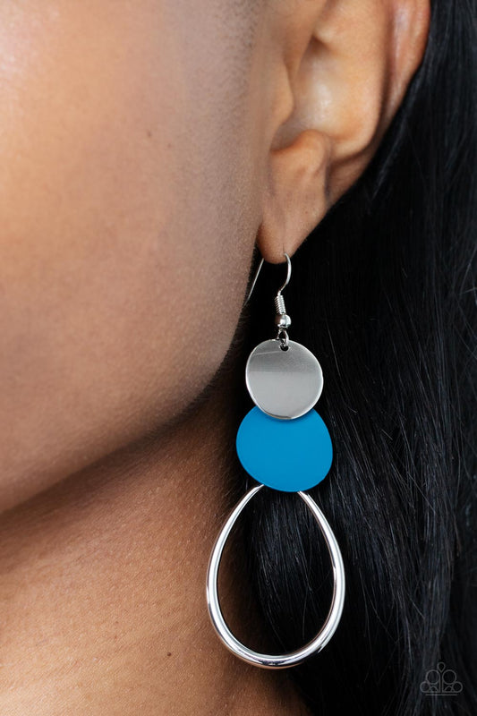 Retro Reception Blue Earring - Paparazzi Accessories   Featuring slightly bent surfaces, a shiny silver and a Mykonos Blue matte disc links with an airy silver teardrop frame, resulting in a retro lure. Earring attaches to a standard fishhook fitting.  Sold as one pair of earrings.