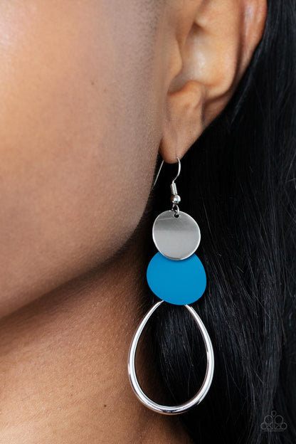 Retro Reception Blue Earring - Paparazzi Accessories   Featuring slightly bent surfaces, a shiny silver and a Mykonos Blue matte disc links with an airy silver teardrop frame, resulting in a retro lure. Earring attaches to a standard fishhook fitting.  Sold as one pair of earrings.