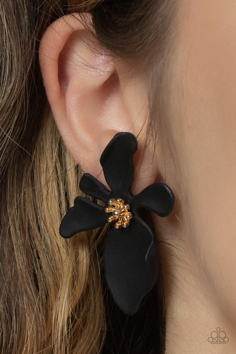 Hawaiian Heiress Black Post Earring - Paparazzi Accessories  Featuring a golden studded center, asymmetrical black petals bloom into an abstract flower for a tropical inspired look. Earring attaches to a standard post fitting.  Sold as one pair of post earrings.