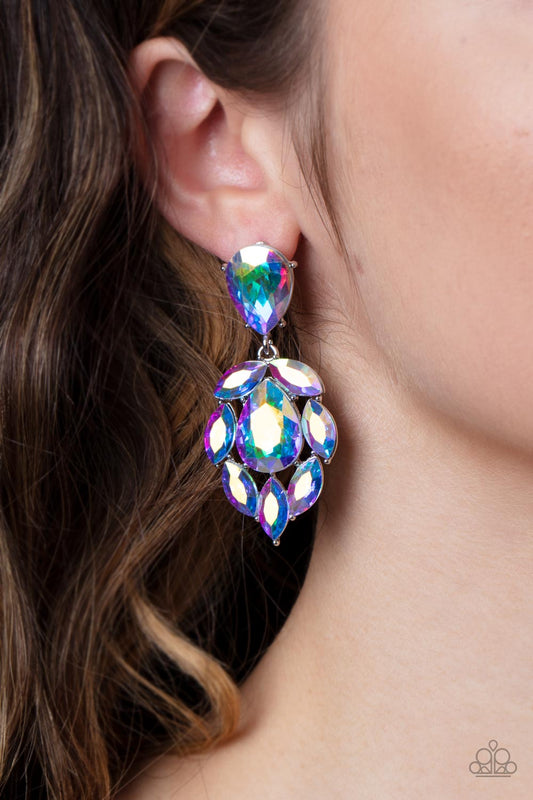 Galactic Go-Getter Multi Earring - Paparazzi Accessories  A stellar collection of marquise cut iridescent rhinestones nestle around an oversized teardrop iridescent rhinestone, creating a dramatically stellar display at the bottom of a matching oil spill teardrop rhinestone. Earring attaches to a standard post fitting.  Sold as one pair of post earrings.