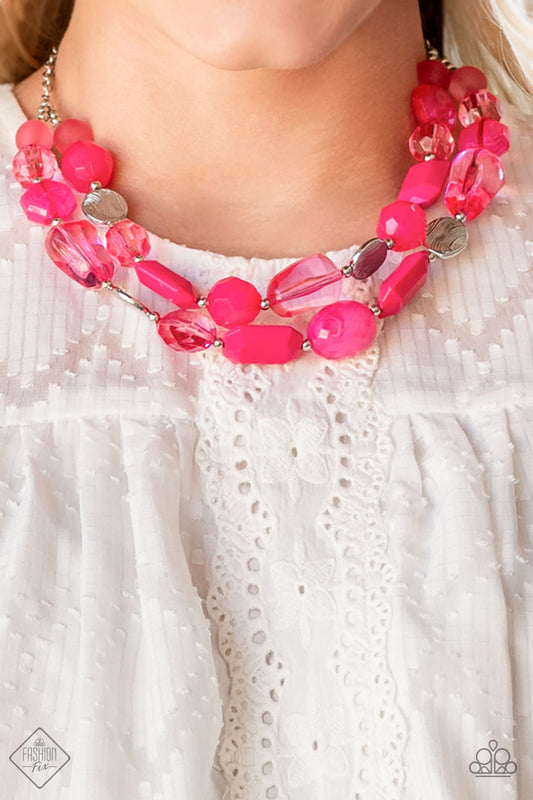 Oceanic Opulence Pink Necklace - Paparazzi Accessories   Varying in shape and opacity, a vibrant collection of faceted and smooth Raspberry Sorbet beads join textured silver discs and dainty silver beads along two thin wires, layering into a flamboyant pop of color below the collar. Features an adjustable clasp closure.  Sold as one individual necklace. Includes one pair of matching earrings.  Get The Complete Look! Bracelet: "Oceanside Bliss - Pink" (Sold Separately)