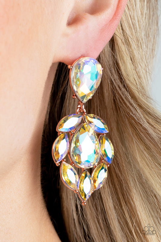 Galactic Go-Getter Copper Earring - Paparazzi Accessories  A stellar collection of marquise cut iridescent rhinestones nestle around an oversized teardrop iridescent rhinestone, creating a dramatically stellar display at the bottom of a matching iridescent teardrop rhinestone. Earring attaches to a standard post fitting.  Sold as one pair of post earrings.