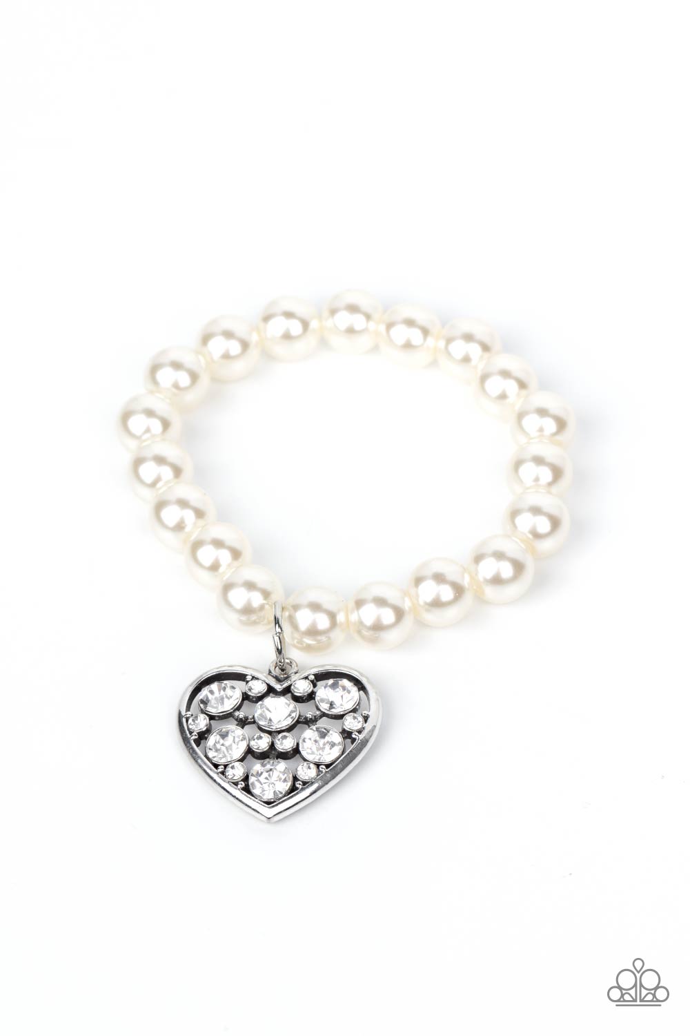 Cutely Crushing White Pearl Bracelet - Paparazzi Accessories  A dramatically oversized white rhinestone encrusted silver heart charm dangles from a stretchy strand of bubbly white pearls, creating a flirtatious dazzle.  All Paparazzi Accessories are lead free and nickel free!  Sold as one individual bracelet.