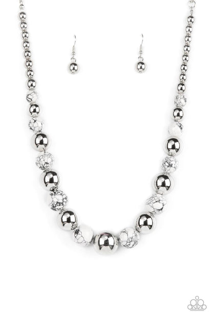 Stone Age Adventurer White Necklace - Paparazzi Accessories  Featuring a white and black marble finish, an earthy collection of faux stone and classic silver beads gradually increase in size as they alternate below the collar for a statement-making look. Features an adjustable clasp closure.  Sold as one individual necklace. Includes one pair of matching earrings.