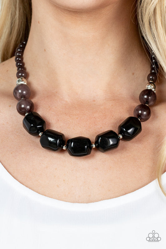 Ten Out of TENACIOUS Black Necklace - Paparazzi Accessories  Accented with bright silver beads and glittery rhinestone accents, a row of oversized subtly faceted black beads gives way to marbled beads that transition to smaller opaque beads as they make their way around the collar for a modern fashion. Features an adjustable clasp closure.  Sold as one individual necklace. Includes one pair of matching earrings.