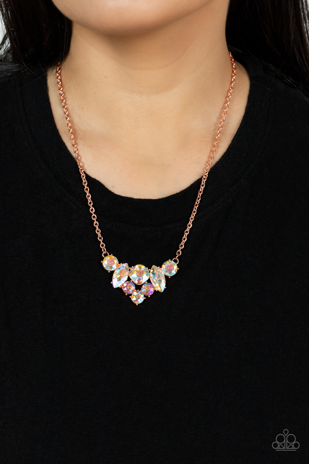 Lavishly Loaded Copper Necklace - Paparazzi Accessories  A glittering collection of marquise and round peach-colored gems encased in studded copper fittings, coalesce into a lavish frame that gives way to a classic shiny copper chain resulting in a glamorous finish below the collar. Features an adjustable clasp closure.  All Paparazzi Accessories are lead free and nickel free!  Sold as one individual necklace. Includes one pair of matching earrings.