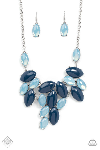 Date Night Nouveau Blue Necklace - Paparazzi Accessories  Dewy oval-shaped Navy Blue and Spring Lake opals, set in exaggerated silver pronged settings and suspended from silver chains, coalesce into an asymmetrical arrangement that makes a bold impact below the collar. Features an adjustable clasp closure.  All Paparazzi Accessories are lead free and nickel free!  Sold as one individual necklace. Includes one pair of matching earrings.