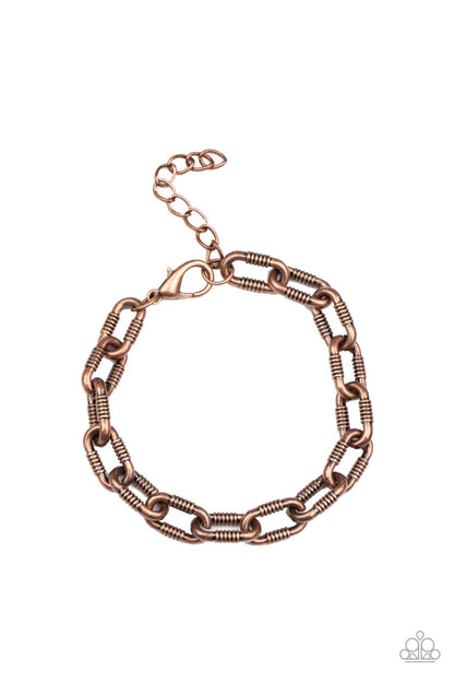 Industrial Infantry Copper Urban Bracelet - Paparazzi Accessories  Featuring gritty texture, an oversized copper chain links around the wrist for an edgy urban look. Features an adjustable clasp closure.  Sold as one individual bracelet.  Get The Complete Look!  Necklace: "Rural Recruit - Copper" (Sold Separately)