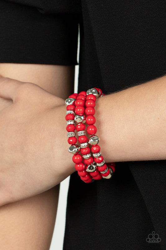 Vibrant Verve Red Bracelet - Paparazzi Accessories  Featuring smooth, textured, and faceted finishes, a mismatched collection of fiery red and shiny silver beads are threaded along a coiled wire, creating a vivacious wire wrap bracelet around the wrist.  Sold as one individual bracelet.