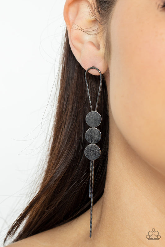 Bolo Beam Black Post Earring - Paparazzi Accessories  A gunmetal loop of round snake chain is held in place by a trio of scratched gunmetal discs, creating a trendy bolo-like lure. Earring attaches to a standard post fitting.  Sold as one pair of post earrings.