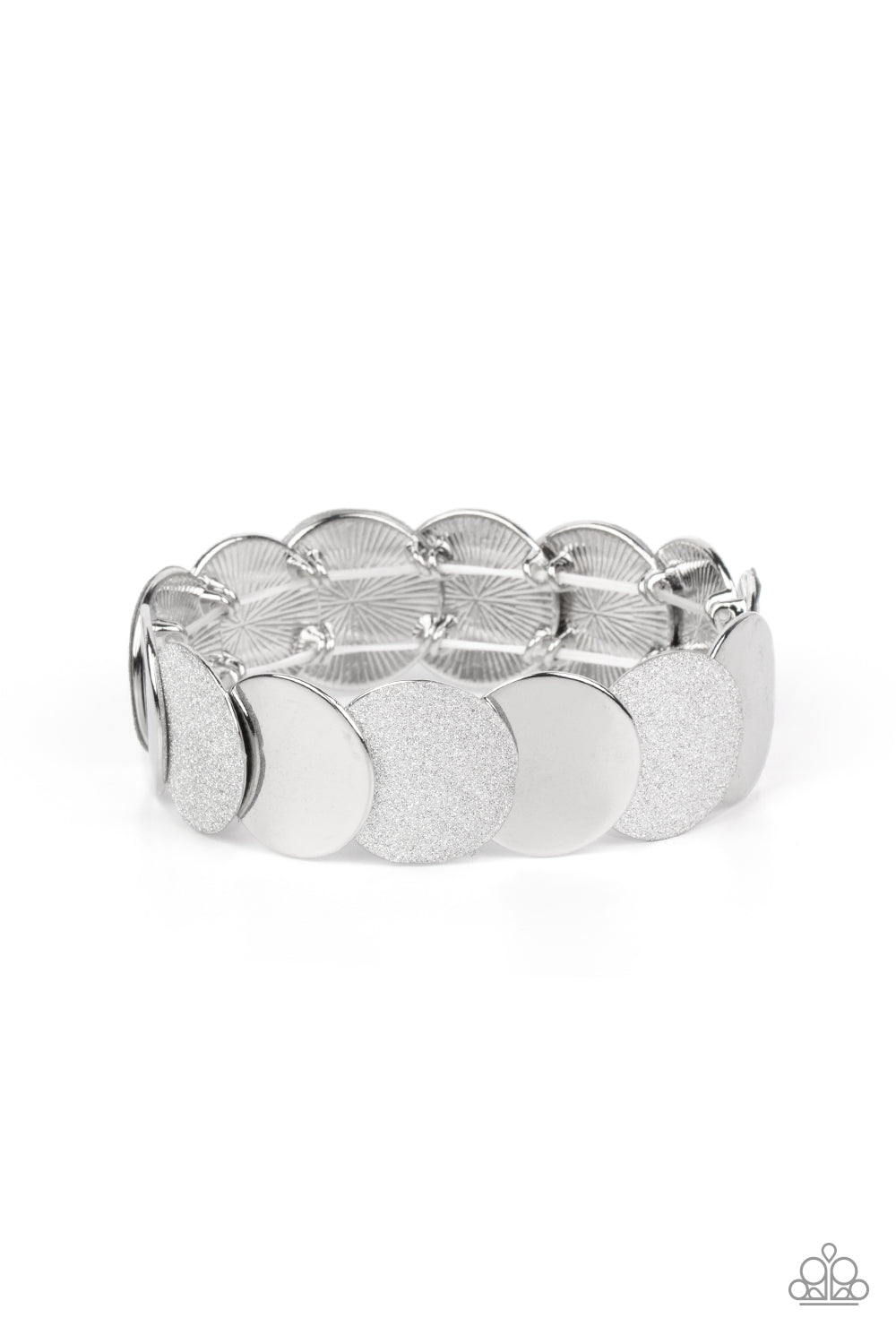 Demurely Disco Silver Bracelet - Paparazzi Accessories  A glimmering collection of shiny silver discs and glitter coated silver discs delicately overlap along stretchy bands around the wrist, creating a dazzling hint of shimmer.  Sold as one individual bracelet.