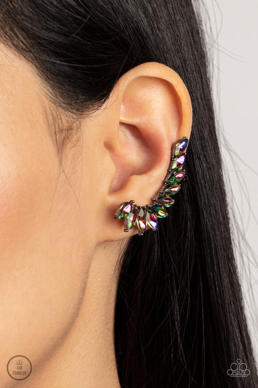Stargazer Glamour Multi Ear Crawler Earring - Paparazzi Accessories  A stellar stack of marquise oil spill rhinestones curve up the ear, creating a smoldering sparkle. Features a clip-on fitting at the top for a secure fit.  Sold as one pair of ear crawlers.