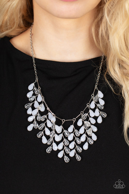 Garden Fairytale White Necklace - Paparazzi Accessories  A shimmery collection of opaque and clear crystal-like teardrop beads delicately cluster along a linked strand of silver bars, creating a frosty and leafy fringe below the collar. Features an adjustable clasp closure.  Sold as one individual necklace. Includes one pair of matching earrings.