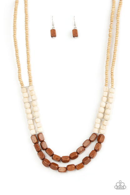 Bermuda Bellhop Brown Necklace - Paparazzi Accessories  Varying in shape, size, and color, an earthy collection of tan, white, and brown wood beads are threaded along invisible wire across the chest, creating tropical inspired layers. Features an adjustable clasp closure.  Sold as one individual necklace. Includes one pair of matching earrings.