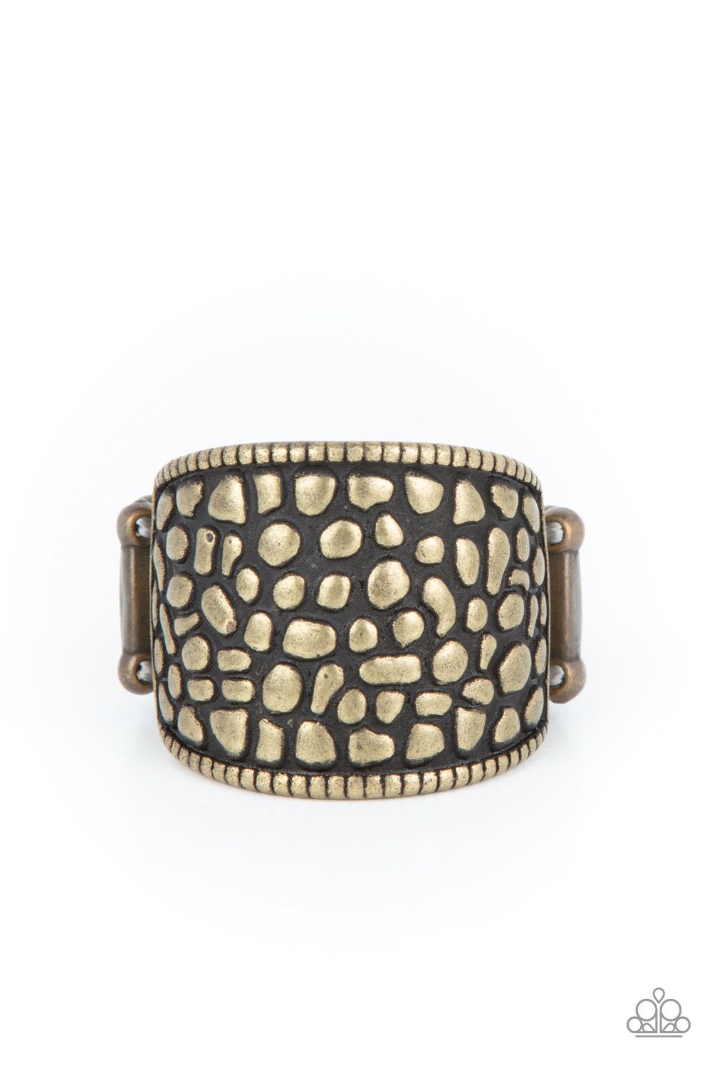 Dotted Decorum - Brass Item #P4BA-BRXX-025XX Brimming from edge to edge with a studded texture reminiscent of cobblestone, a wide brass band is bordered in dainty studs resulting in a free-spirited fashion atop the finger. Features a stretchy band for a flexible fit.  Sold as one individual ring.