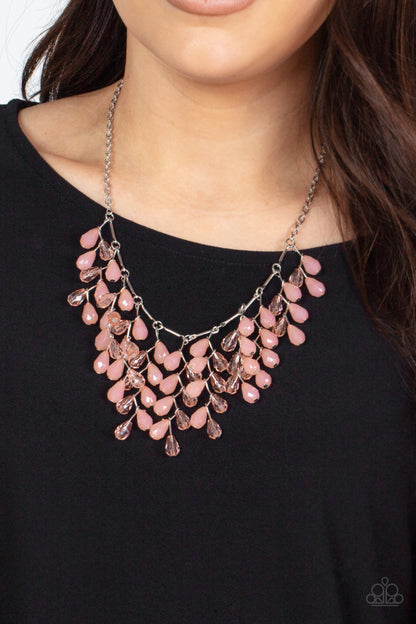 Garden Fairytale - Pink Item #P2ST-PKXX-107XX A shimmery collection of opaque and clear crystal-like Pale Rosette teardrop beads delicately cluster along a linked strand of silver bars, creating an ethereally leafy fringe below the collar. Features an adjustable clasp closure.  Sold as one individual necklace. Includes one pair of matching earrings.