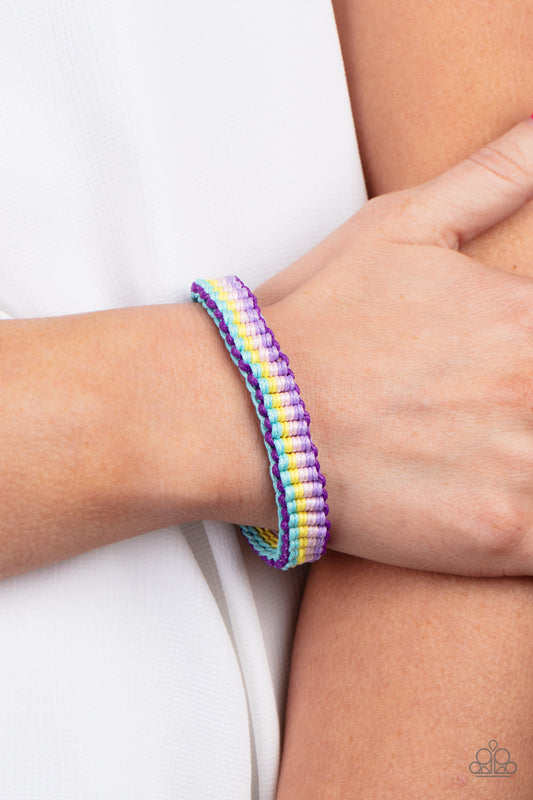 Campfire Craft Multi Bracelet - Paparazzi Accessories  Purple, blue, pink, and yellow thread is decoratively knotted around the wrist, creating a colorful rainbow. Features an adjustable sliding knot closure.  Sold as one individual bracelet.