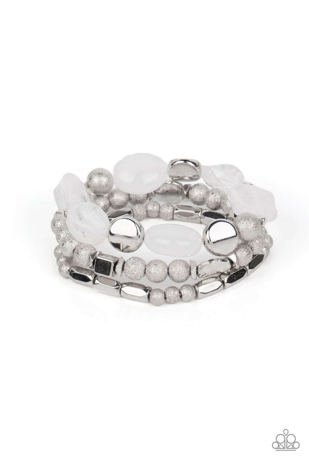 Marina Magic White Bracelet - Paparazzi Accessories  Infused with enchanting pops of white crystal-like and glassy accents, a mismatched assortment of hammered, cube, and faceted silver beads are threaded along stretchy bands around the wrist, creating shimmery layers.  Sold as one set of three bracelets.