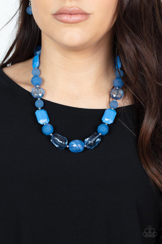 Here Today, GONDOLA Tomorrow Blue Necklace - Paparazzi Accessories  Varying in shape and opacity, a mismatched display of acrylic, opaque, and crystal-like blue beads alternate with dainty silver beads across the chest for a prismatic pop of color. Features an adjustable clasp closure.  Sold as one individual necklace. Includes one pair of matching earrings.