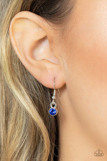 Seasonal Sophistication Blue Necklace - Paparazzi Accessories  A bubbly collection of blue, Mykonos Blue, and Spring Lake rhinestones coalesce inside an airy silver teardrop, resulting in an effervescently elegant pendant at the bottom of a rounded silver snake chain. Features an adjustable clasp closure.  Sold as one individual necklace. Includes one pair of matching earrings.