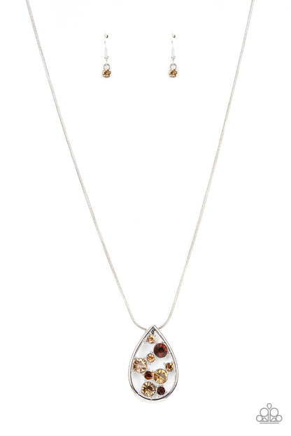 Seasonal Sophistication - Brown Item #P2RE-BNXX-277XX A bubbly collection of classic and golden topaz rhinestones coalesce inside an airy silver teardrop, resulting in an effervescently elegant pendant at the bottom of a rounded silver snake chain. Features an adjustable clasp closure.  Sold as one individual necklace. Includes one pair of matching earrings.