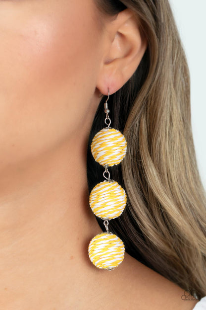 Laguna Lanterns Yellow Earring - Paparazzi Accessories  A woven collection of Illuminating and white crepe-like strings ornately wraps around three hanging beads, reminiscent of decorative party lanterns. Earring attaches to a standard fishhook fitting.  Sold as one pair of earrings.