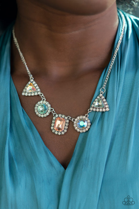 Posh Party Avenue Multi Necklace - Paparazzi Accessories  Featuring triangular, round, and emerald style cuts, an iridescent collection of multicolored rhinestones are bordered in glassy white rhinestones as they delicately link below the collar for a sparkly statement. Features an adjustable clasp closure.  Sold as one individual necklace. Includes one pair of matching earrings.
