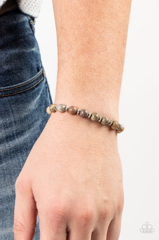 Keep The Peace Silver Urban Bracelet - Paparazzi Accessories  Infused with silver accents, an earthy collection of natural stones are threaded along a stretchy band around the wrist for a tranquil look.  Sold as one individual bracelet.