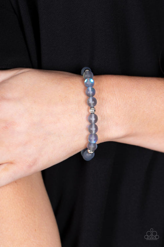 Forever and a DAYDREAM Silver Urban Bracelet - Paparazzi Accessories  Infused with silver accents, a dreamy collection of iridescent rainbow specked beads are threaded along a stretchy band around the wrist for an enchanting glow.  Sold as one individual bracelet.