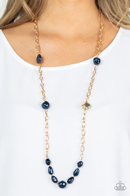 Pardon My FABULOUS - Blue Item #P2RE-BLXX-351XX Infused with dainty gold beads, an elegant collection of imperfect blue pearls and gold beads asymmetrically adorn a substantial gold chain across the chest for an effortless elegance. Features an adjustable clasp closure.  Sold as one individual necklace. Includes one pair of matching earrings.